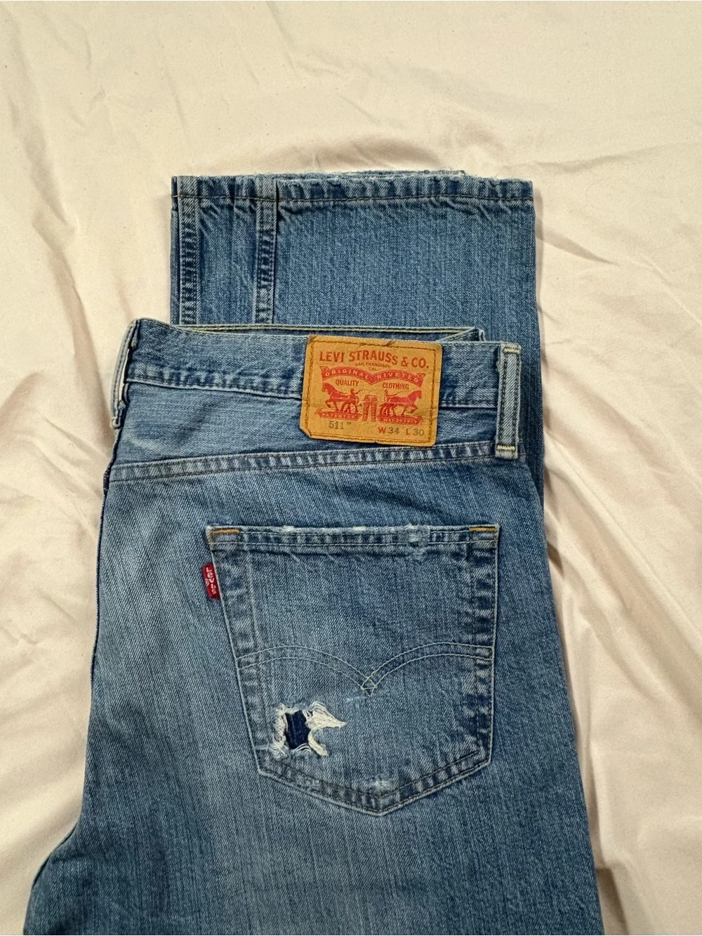 Levi's Men's Distressed Light Blue Straight Leg Denim Jeans